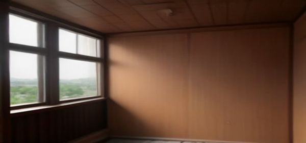 韩国某娱乐公司心理咨询室内景，温暖的灯光与舒适的沙发营造出安全感，墙上挂着鼓励性的文字